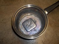 pure lead in a pan with pure lead square.jpg